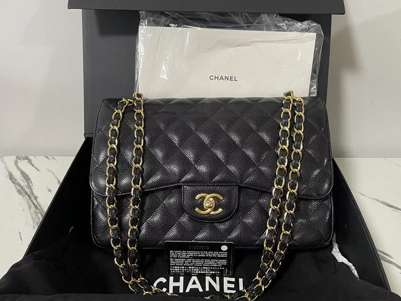 Chanel Black Jumbo Classic Double Flap Bag in Cavier Leather with gold Hardware Chanel Bag MILOURA