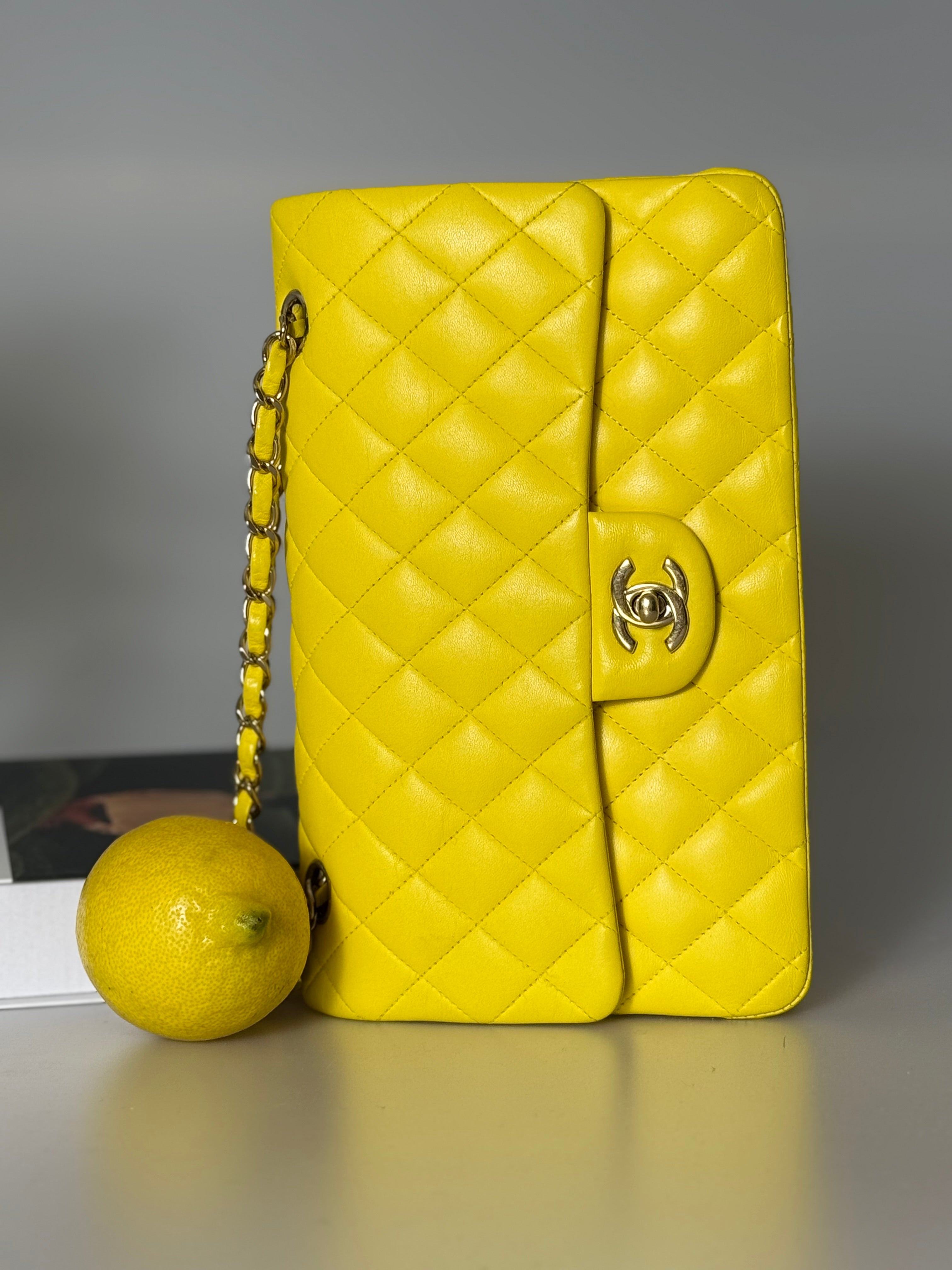 Used Chanel yellow timeless Flap Bag Medium in lambskin leather