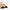 Chanel Beige Suede and Black Grosgrain Pointed Cap Toe CC Slingback Pumps Size 36.5