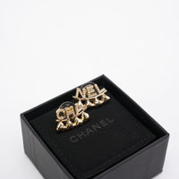Chanel Metal / Rhinestone Stud Earrings with Gold Buckle