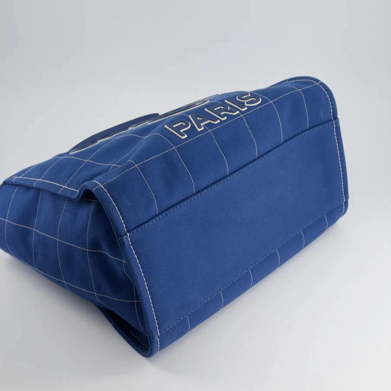 Used Chanel Deauville Tote Bag in Blue Canvas from the 2023 Cruise Collection corner 