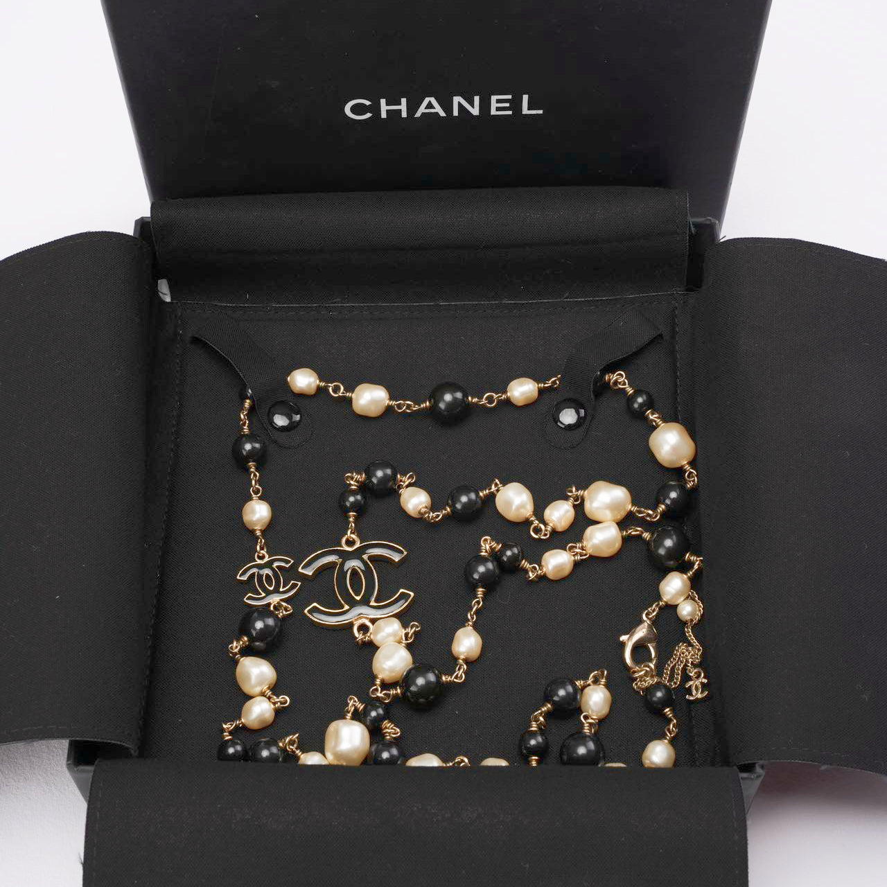 Used Chanel CC Long Necklace with Black Beads and Faux Pearls