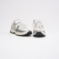 Chanel CC Logo Sneaker in White and Silver 38.5